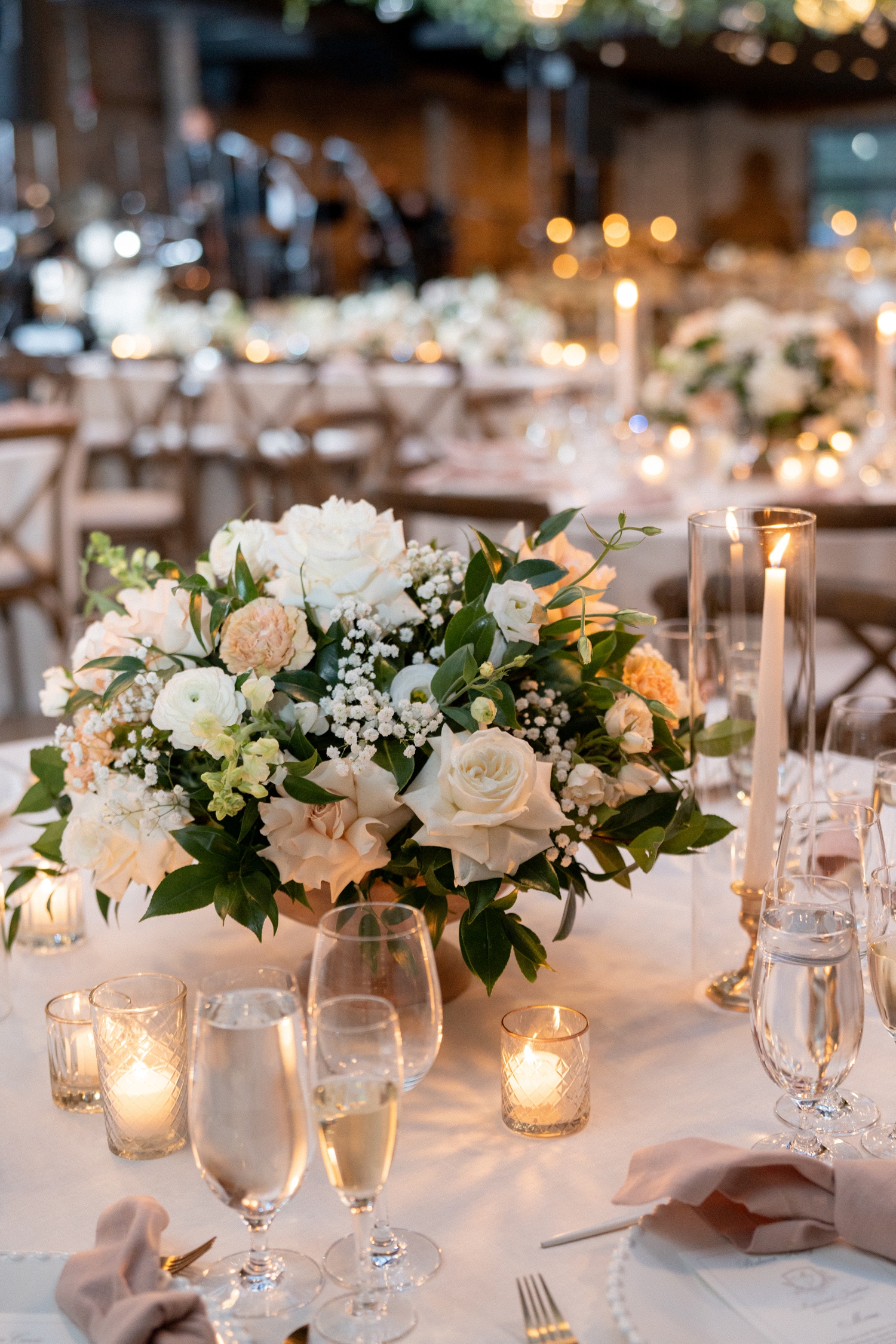 Wedding reception table with flowers at revel motor row chicago
