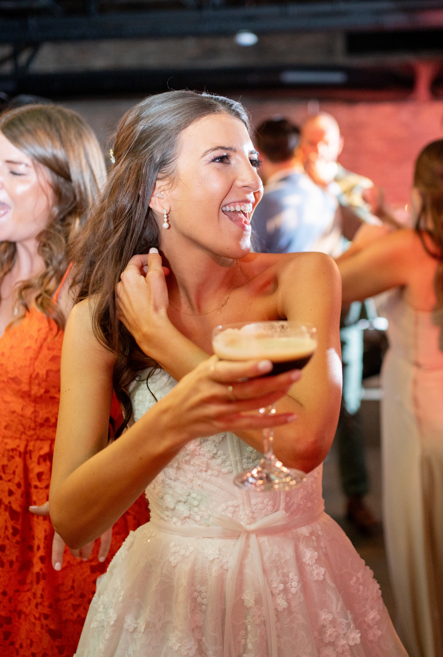 revel motor row photos of bride drinking martini