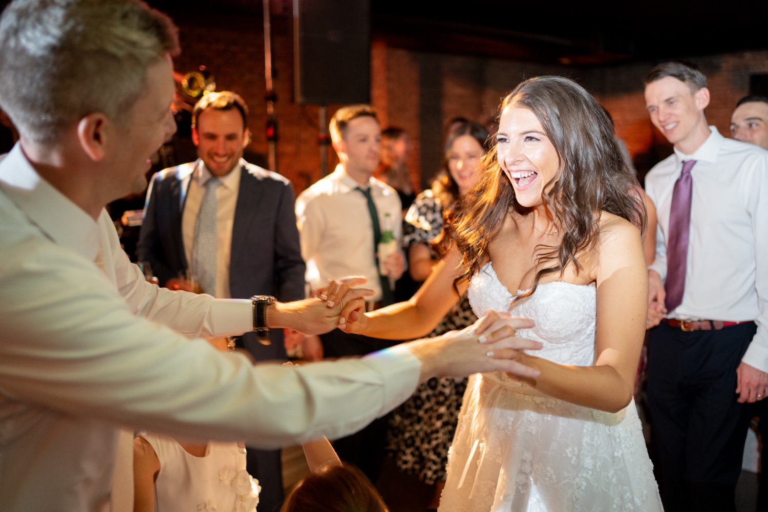 revel motor row photos of bride and groom dancing by Chicago Wedding Photographer Allison Francois