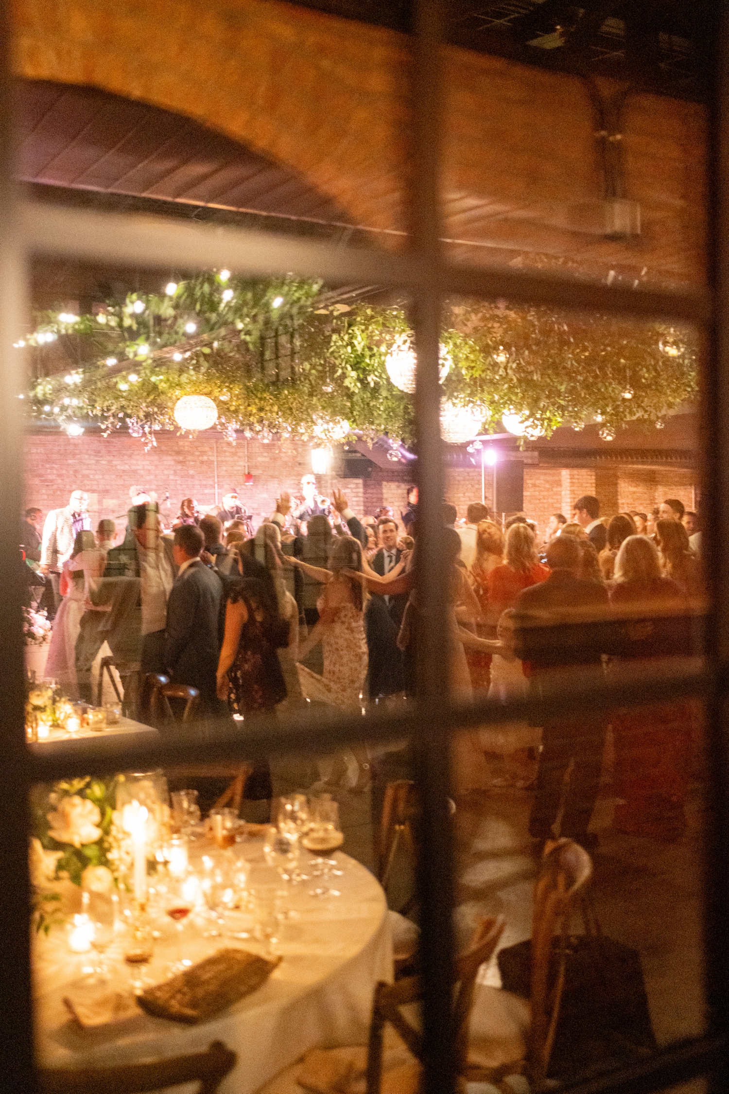 Reception dancing at Revel Motor Row wedding by Chicago Wedding Photographer Allison Francois