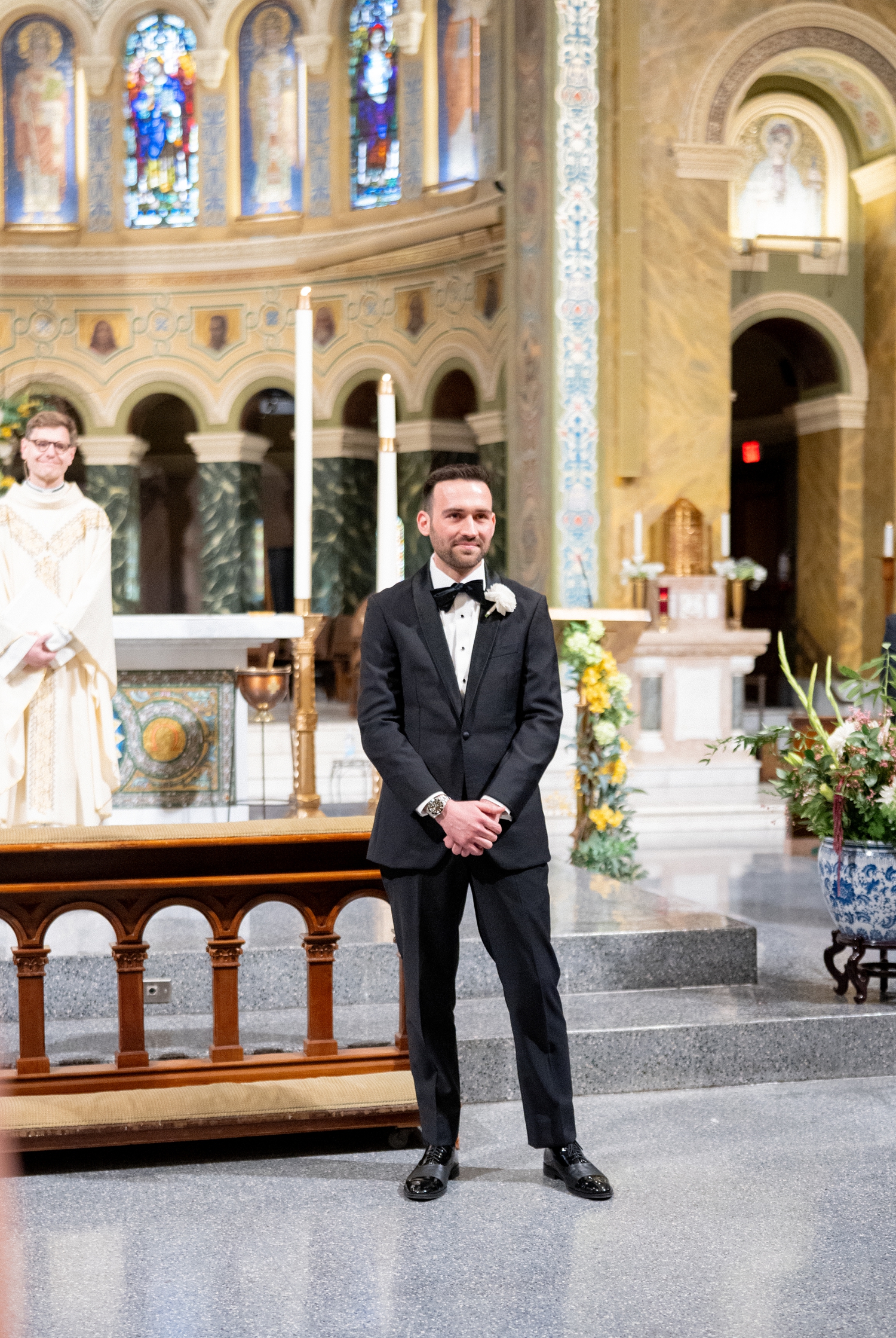 groom at altar at intercontinental chicago magnificent mile wedding