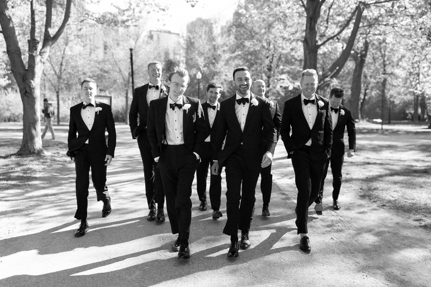 groomsmen walking at intercontinental chicago magnificent mile wedding