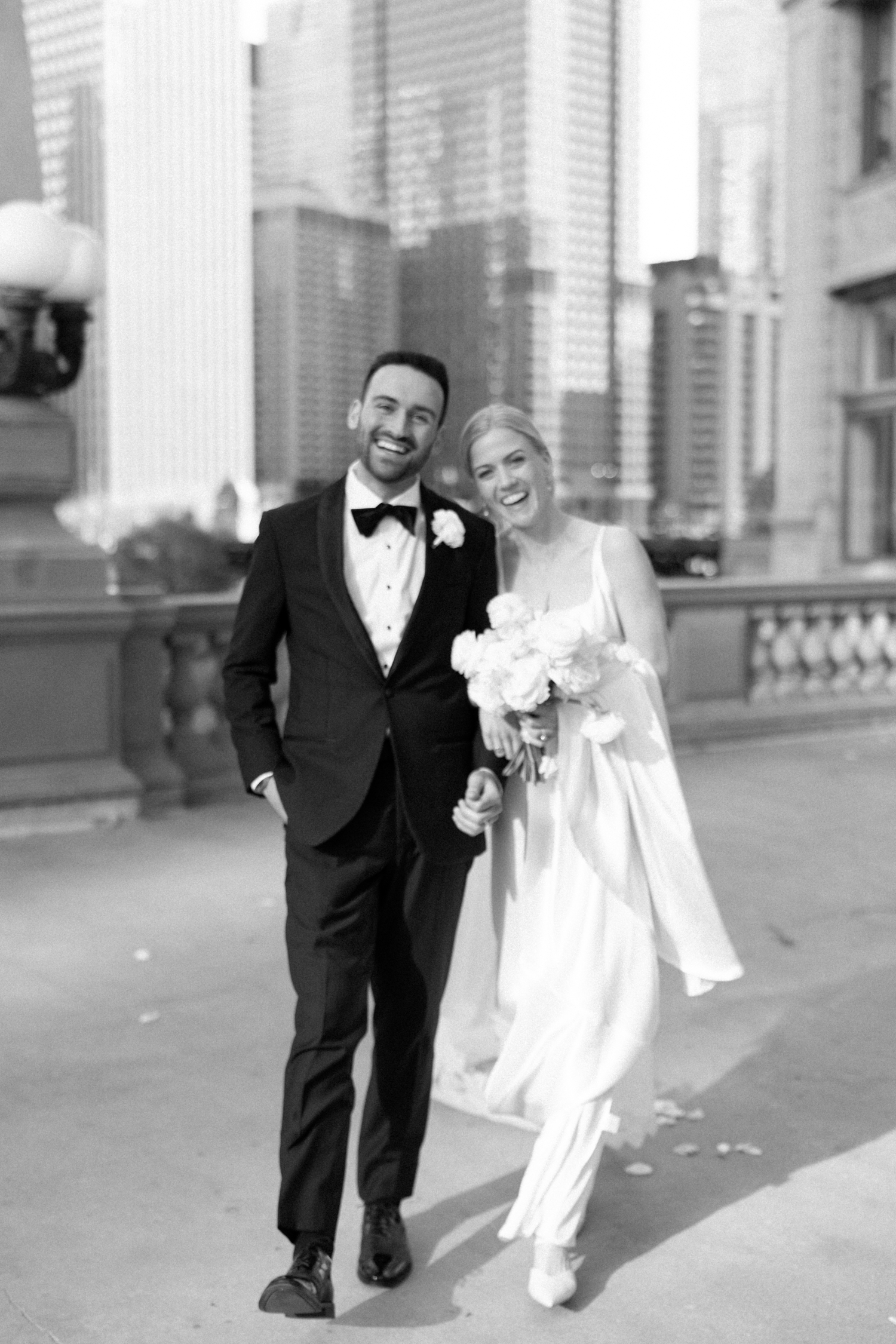 bride and groom smiling at continental hotel chicago