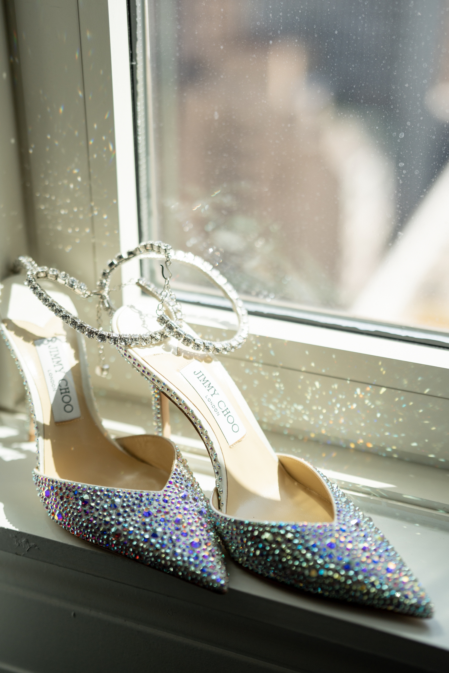 Wedding shoes by the window at the chicago history museum wedding venue​