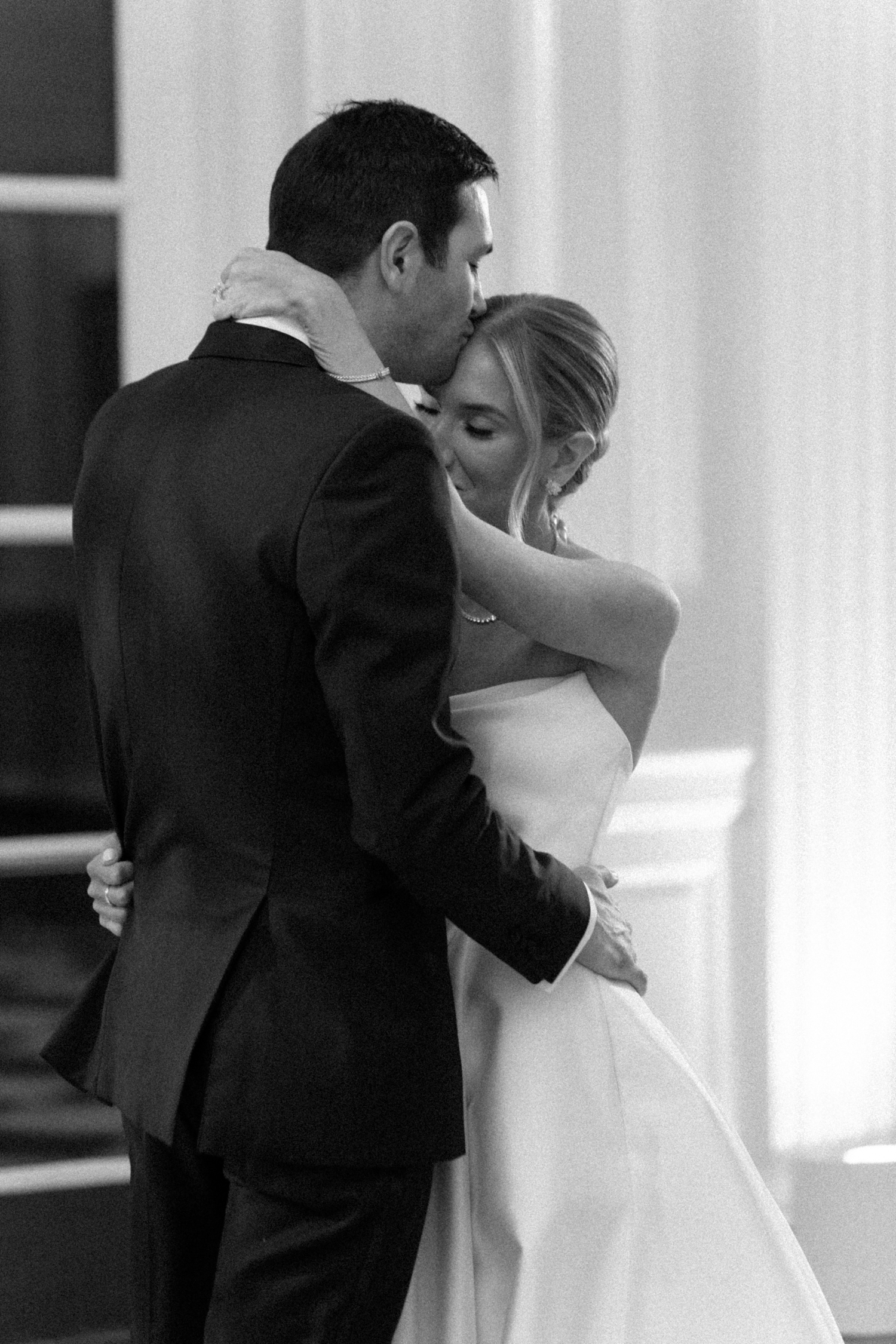 Bride and groom dancing at chicago History Museum Wedding by Chicago Wedding Photographer Allison Francois